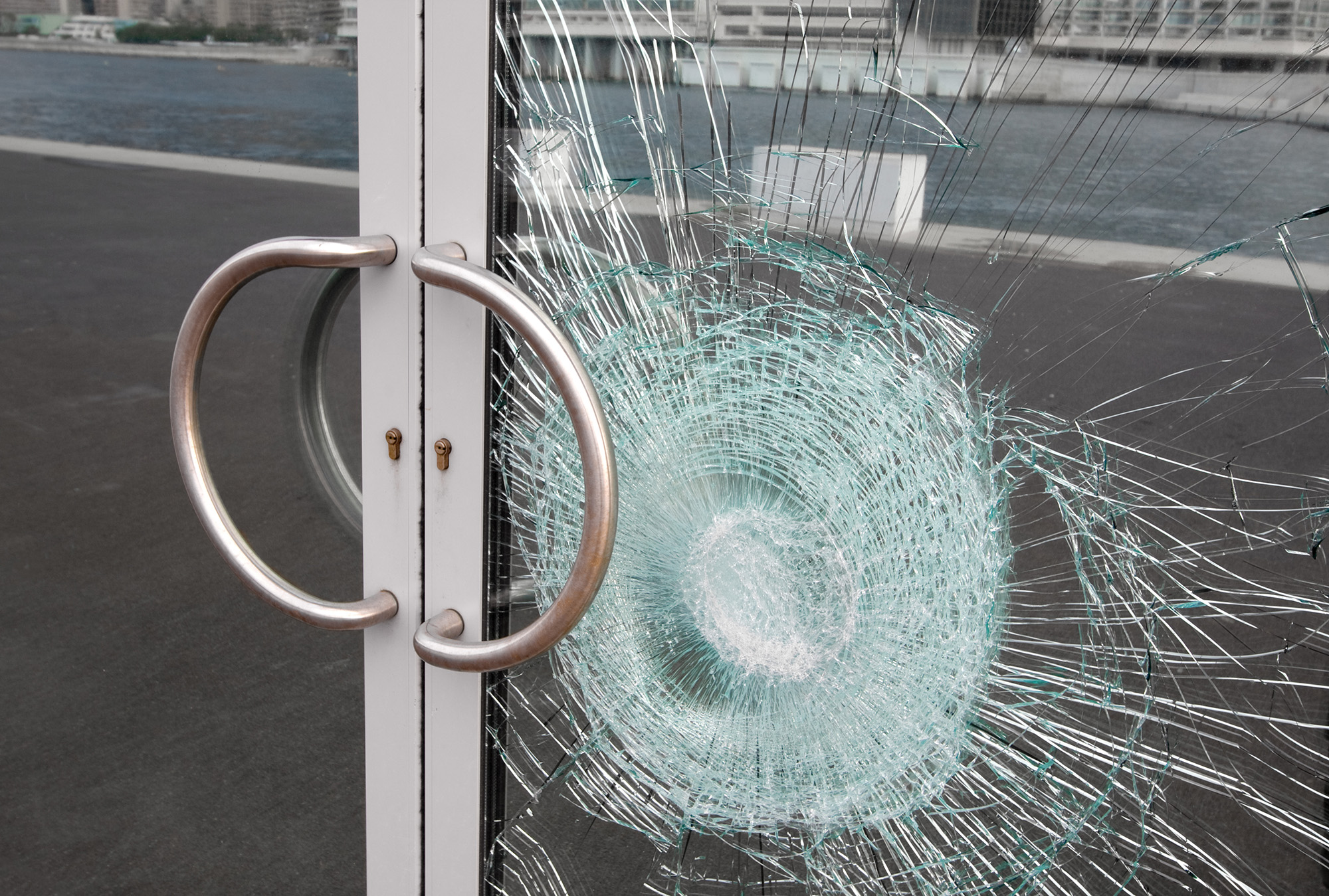 Broken glass on door